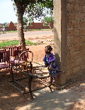 A little girl near the workshop