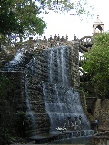 A waterfall and statues