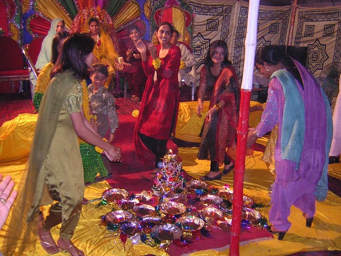 Girls dancing for the bride